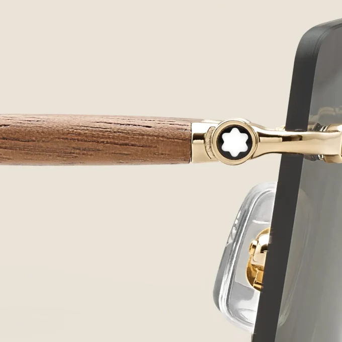 Fyrkantiga solglasögon med guldfärgad metallbåge