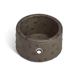 Liten rund skrivbordstråg i strutspräglat läder