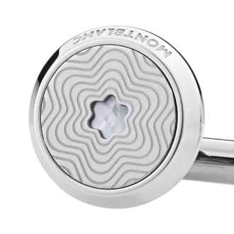 Manschettknappar, runda i rostfritt stål med exploderande stjärnmönster och emblem i pärlemor med snöklädda bergstoppar