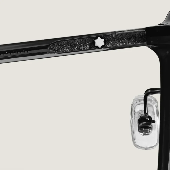 Ovala solglasögon med svart acetatbåge