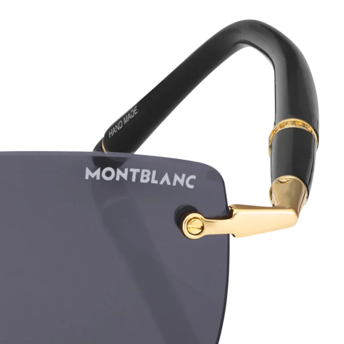 Rektangulära solglasögon med guldfärgad metallbåge