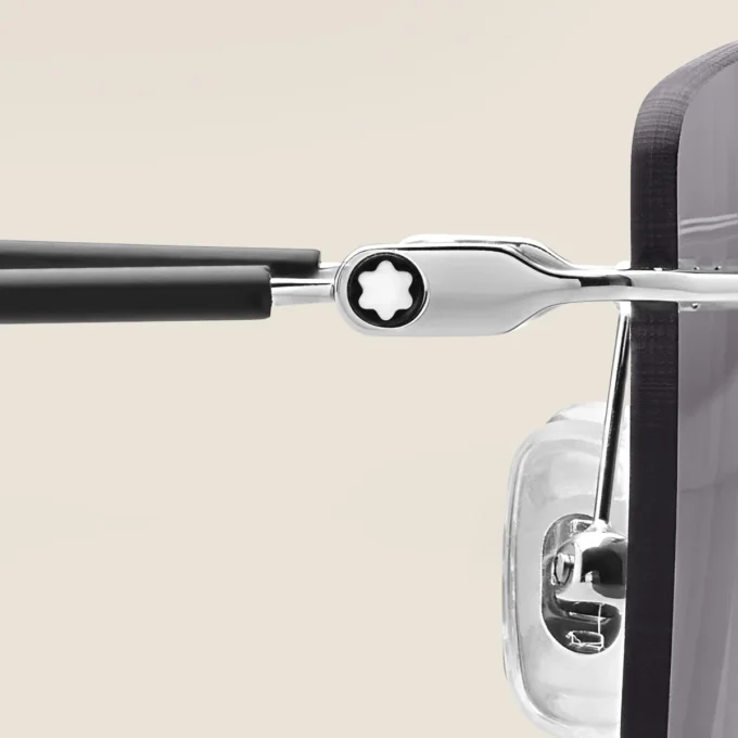 Rektangulära solglasögon med silverfärgad metallbåge