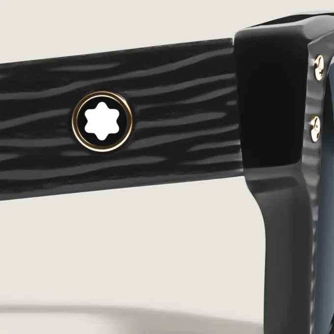 Rektangulära solglasögon med svartfärgad acetatbåge