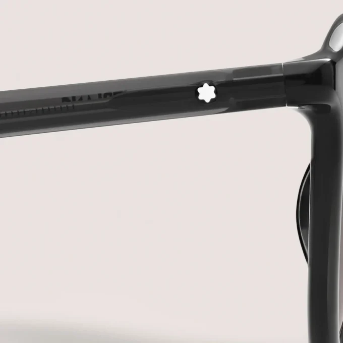 Runda solglasögon med svart injicerad acetatbåge