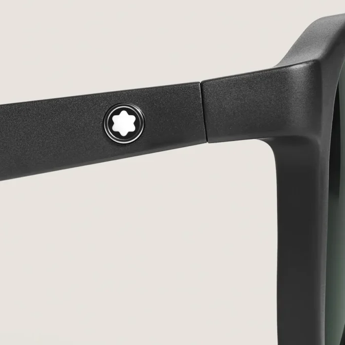 Runda solglasögon med svartfärgad injicerad båge