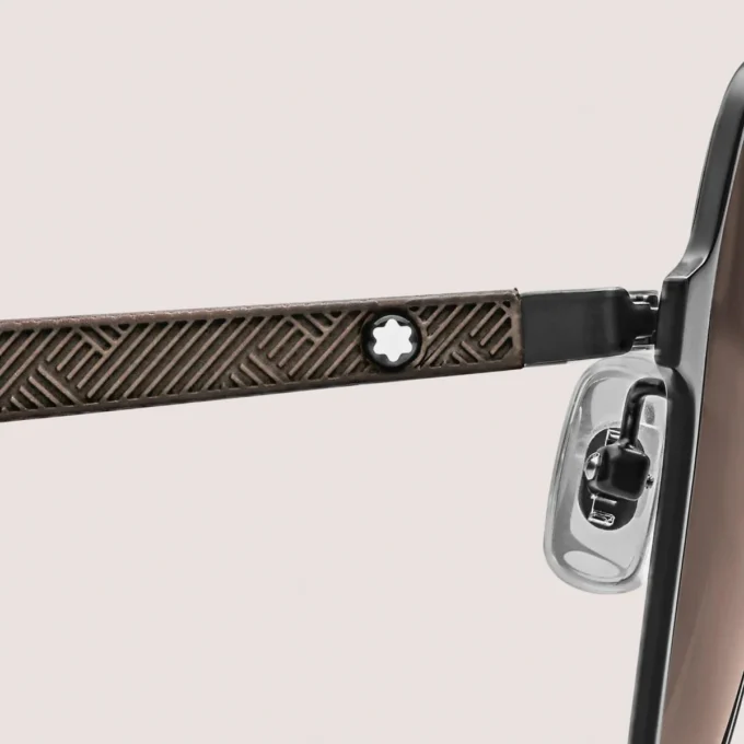 Squared-solglasögon med svart metallbåge